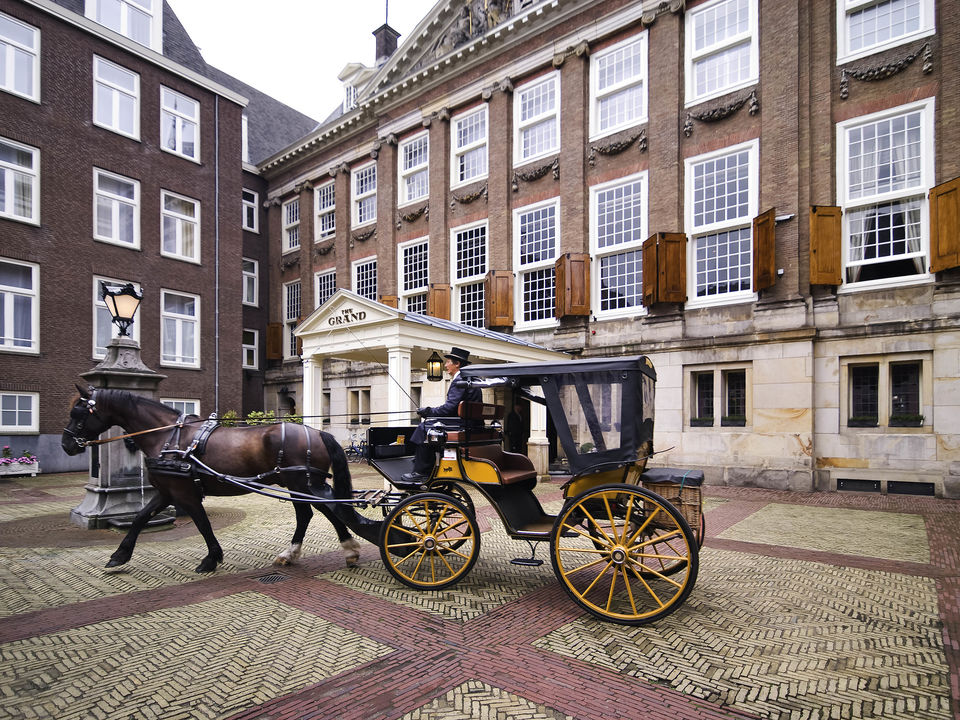 Exterior with Horse and Buggy Outside the Grand